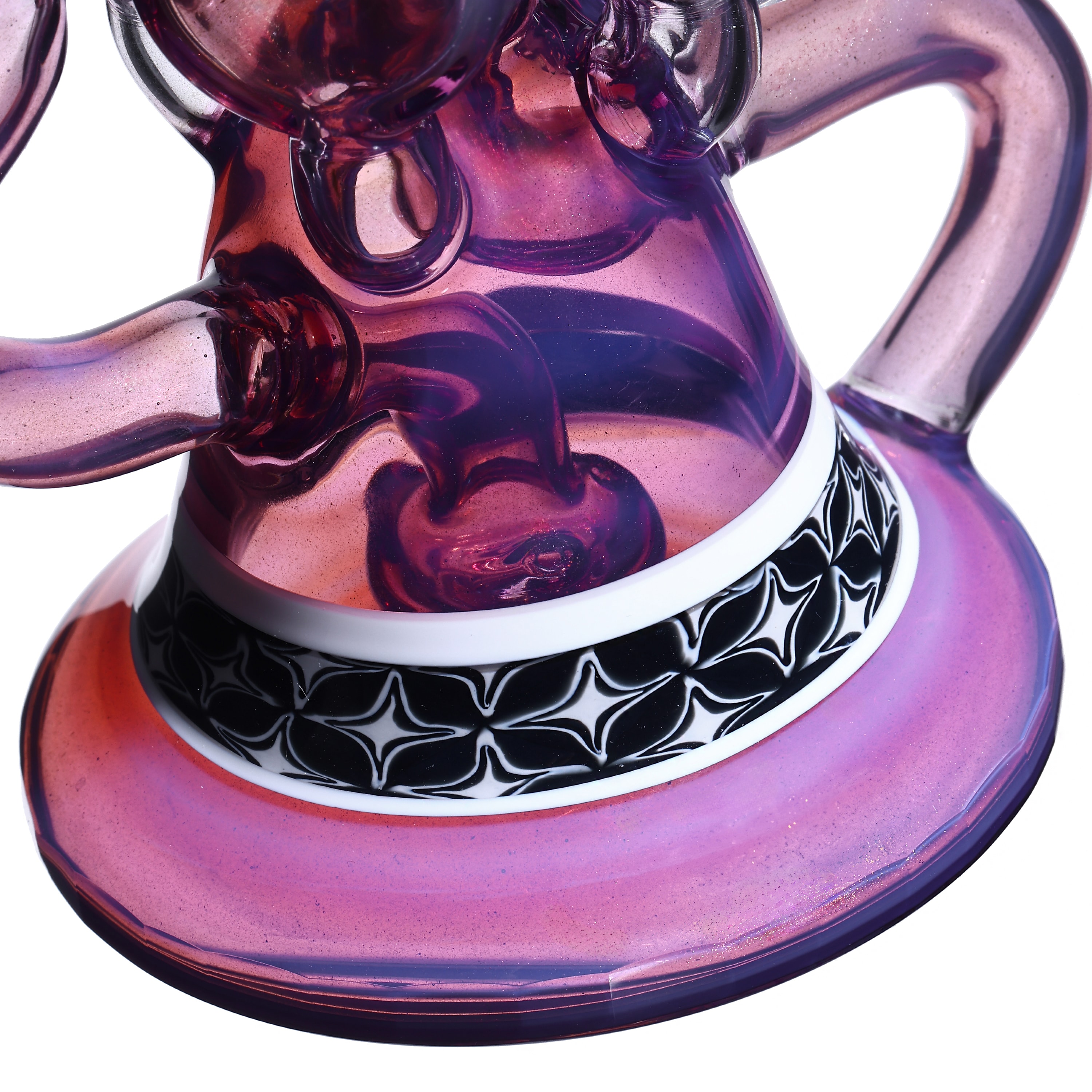 Jack Blew collab — macro close-up of the base, pink and purple tones with black and white pattern