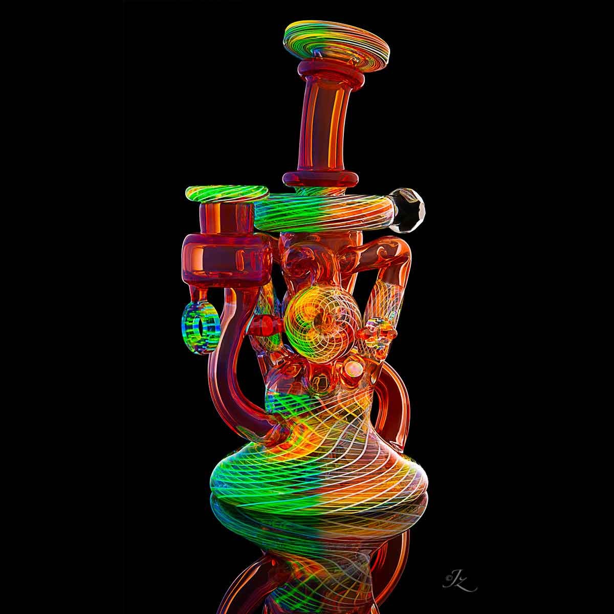 Karma collab — rainbow neon recycler rig on black background