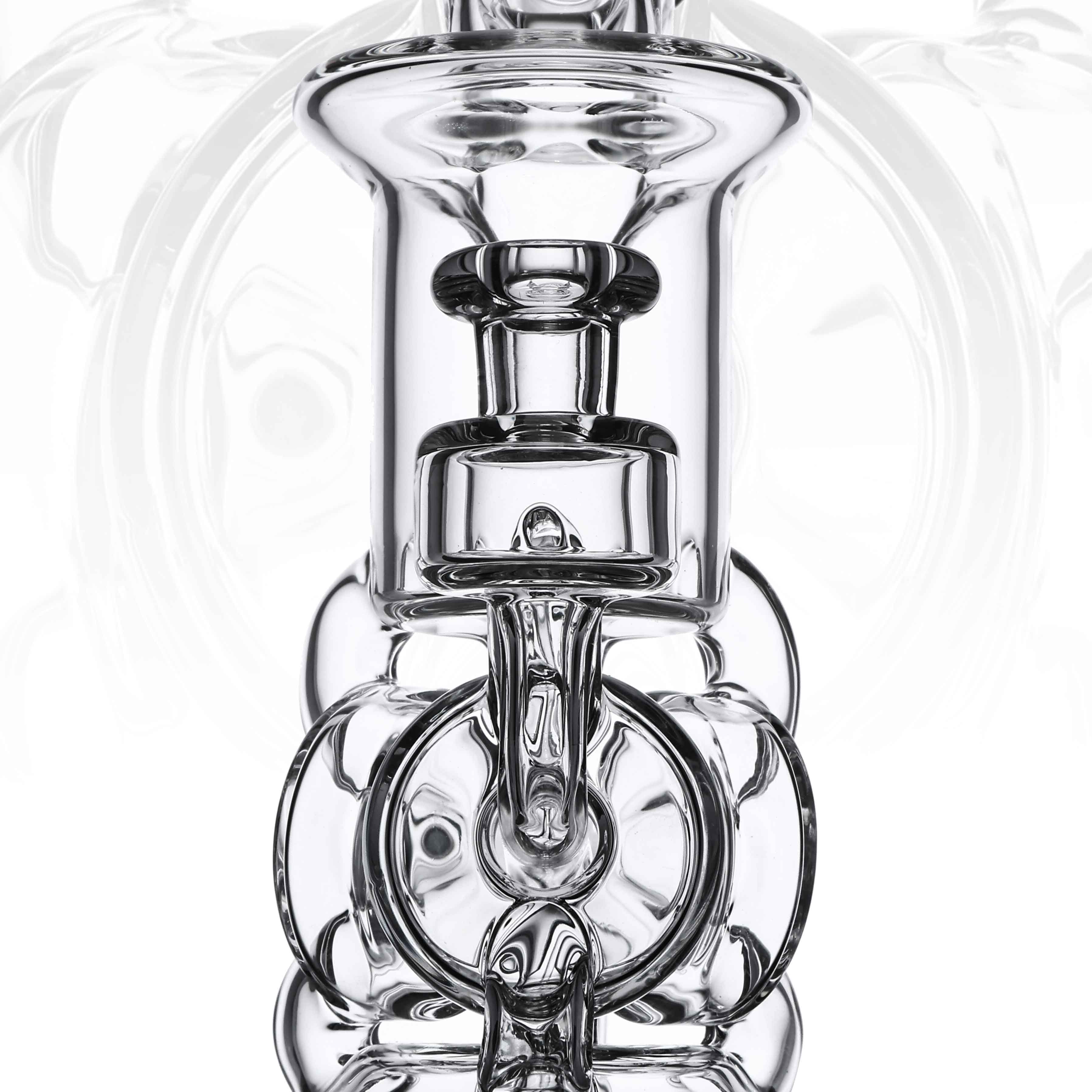 Ubik Series — close-up of the clear glass chamber and recycler tube stack detail