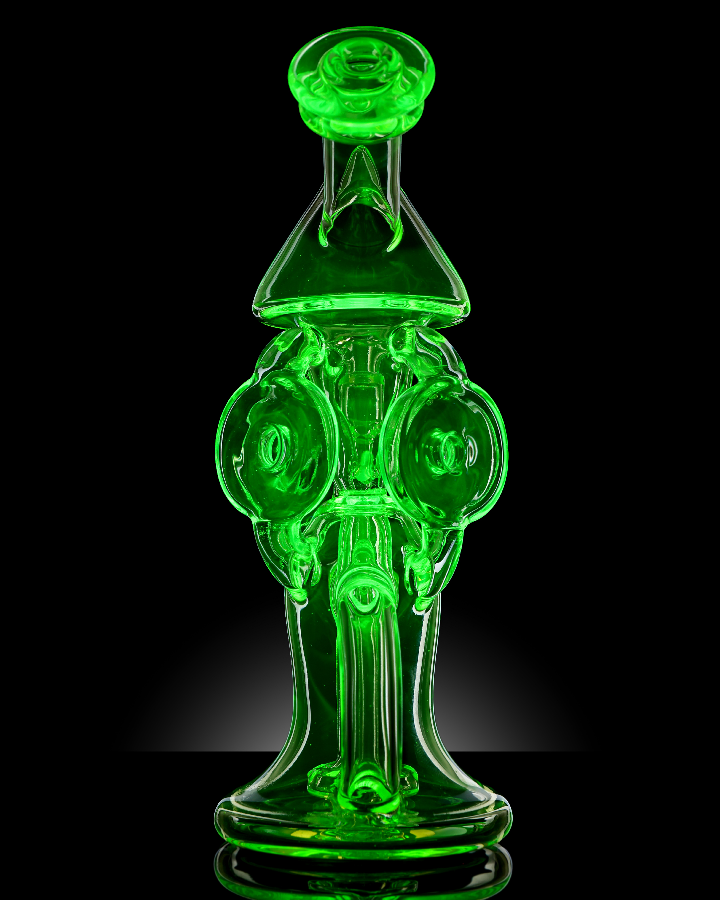 UV Series — neon green rig front view on black background