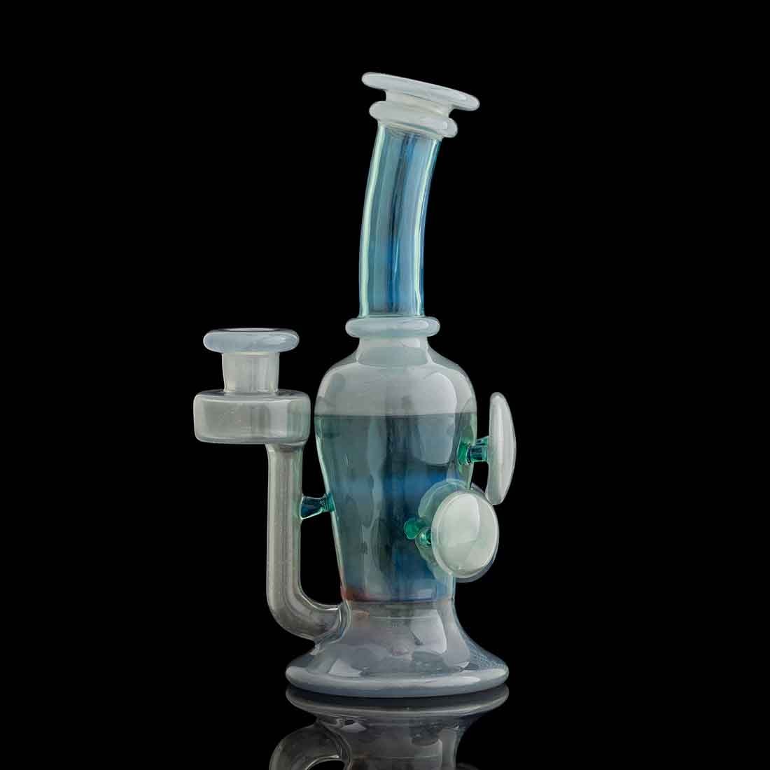 Study of Color and Process — clear and teal recycler rig on black background