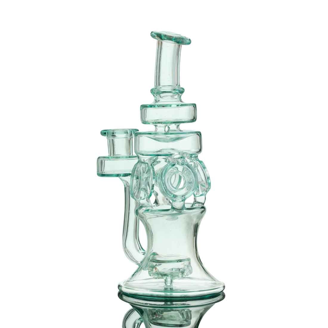 Tonic Series — teal gear recycler rig close-up on white background